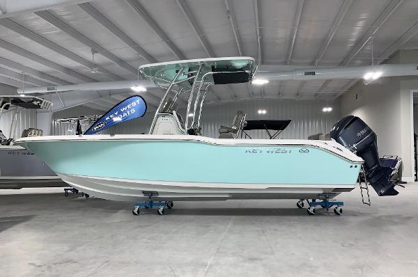 Key West 239 FS 2024 Key West 239 FS boat in showroom, side view.