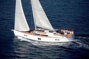 Hanse 545 Sailing yacht Hanse 545, 2012 model, cruising on open sea with full sails.