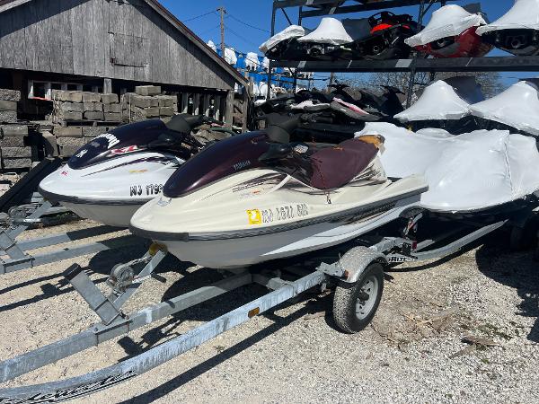 Yamaha WaveRunner XL 800 2000 Yamaha WaveRunner XL 800 jet ski on a trailer in a storage yard.