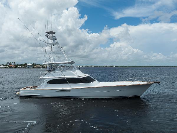 Merritt 72 Convertible 2004 Merritt 72 Convertible yacht on open water under a partly cloudy sky.