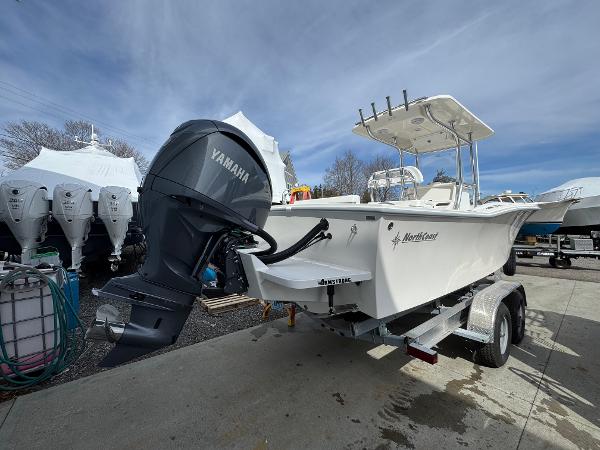 NorthCoast 230 Center Console 2025 NorthCoast 230 Center Console boat with Yamaha engine on trailer.