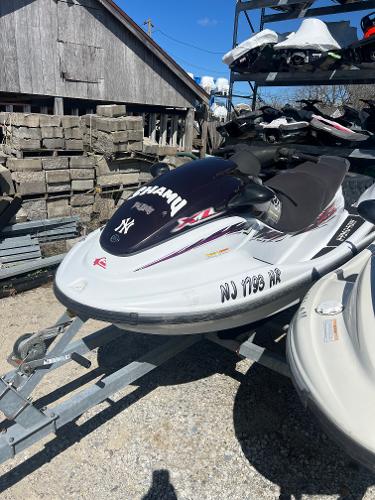 Yamaha WaveRunner XL 1200 1999 Yamaha WaveRunner XL 1200 jet ski on a trailer in a storage yard.