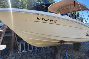 Scout 215 XSF 2017 Scout 215 XSF boat on stands, side view with registration number.