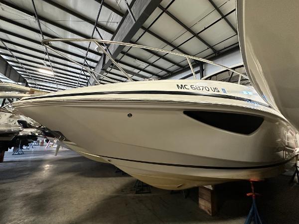 Regal 28 Express 2022 Regal 28 Express boat in indoor storage facility.