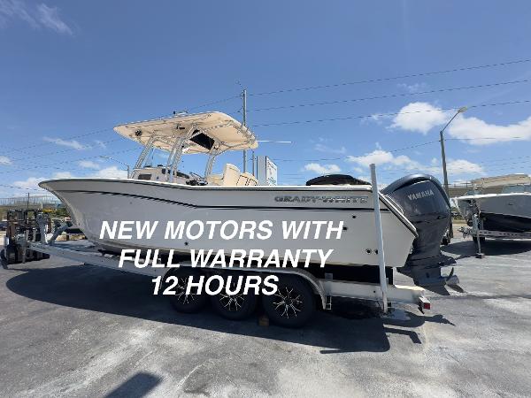 Grady-White Canyon 306 2013 Grady-White Canyon 306 boat with new motors and full warranty, parked on a trailer.