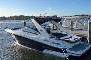 Monterey 328SS Super Sport 2017 Monterey 328SS Super Sport boat docked on a sunny day.