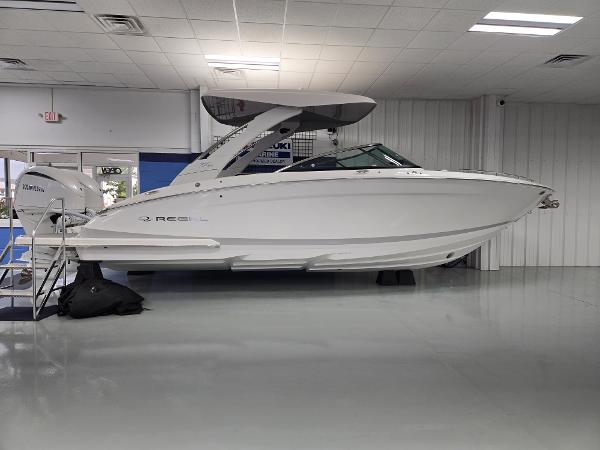 Regal LX9 2025 Regal LX9 boat displayed indoors, sleek white design.