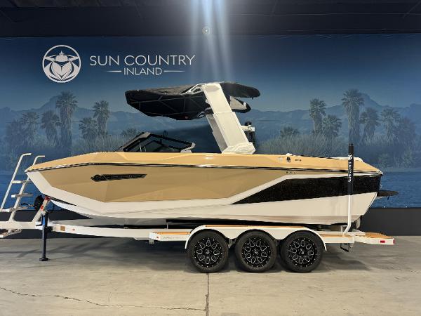 Nautique Super Air G23 2025 Nautique Super Air G23 boat on trailer at Sun Country Inland showroom.