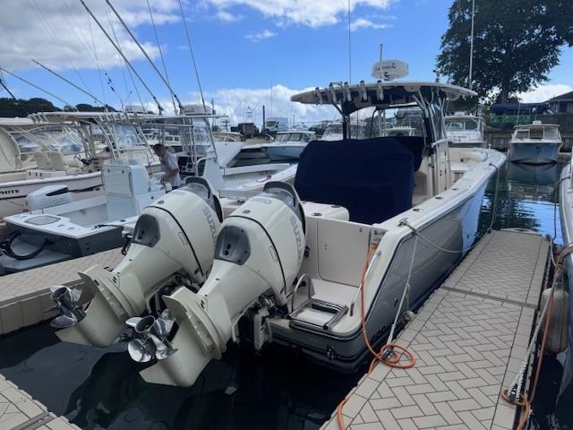 Grady-White 336 Canyon 2008 Grady-White 336 Canyon boat docked with twin outboard engines.
