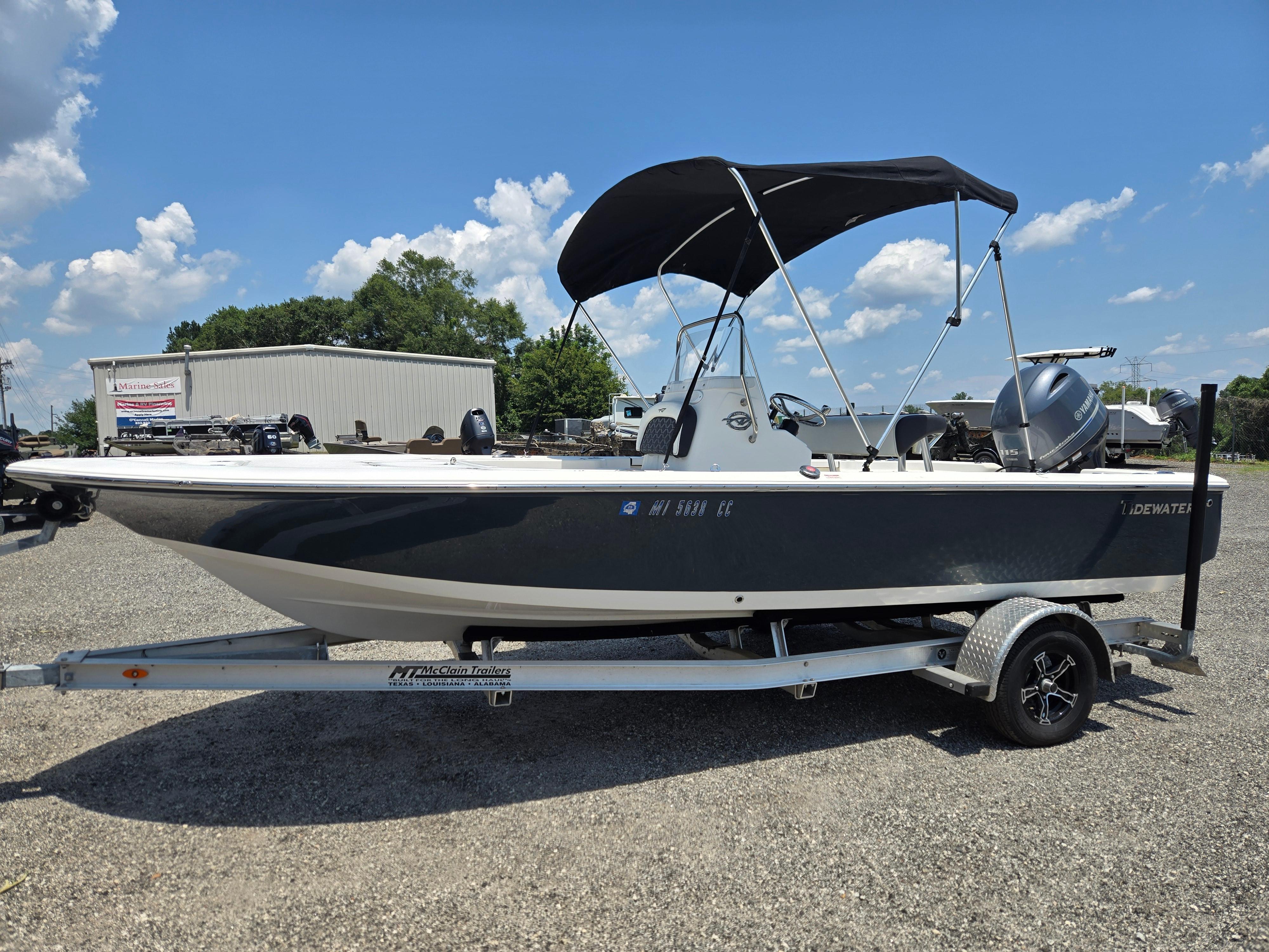 Tidewater 1910 Bay Max 2022 Tidewater 1910 Bay Max boat on trailer, under clear blue sky.