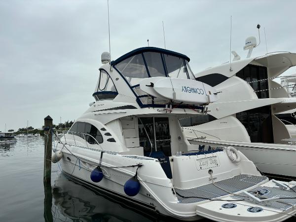 Sea Ray 44 Sedan Bridge 2009 Sea Ray 44 Sedan Bridge yacht docked at marina.