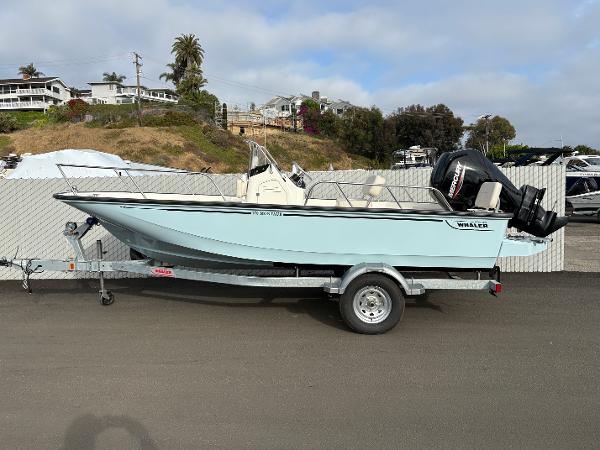 Boston Whaler 170 Montauk 2025 Boston Whaler 170 Montauk boat on trailer, parked outdoors.