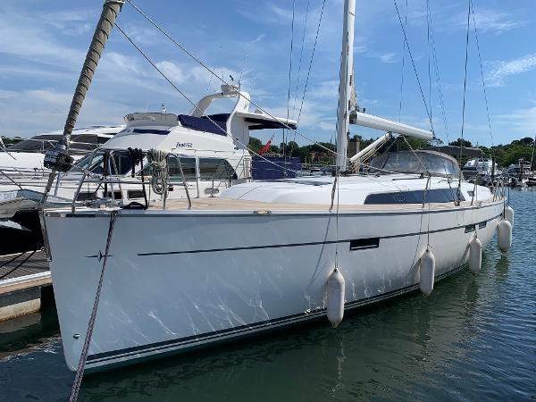 Bavaria Cruiser 46 2014 Bavaria Cruiser 46 yacht docked at marina, clear sky, calm water.
