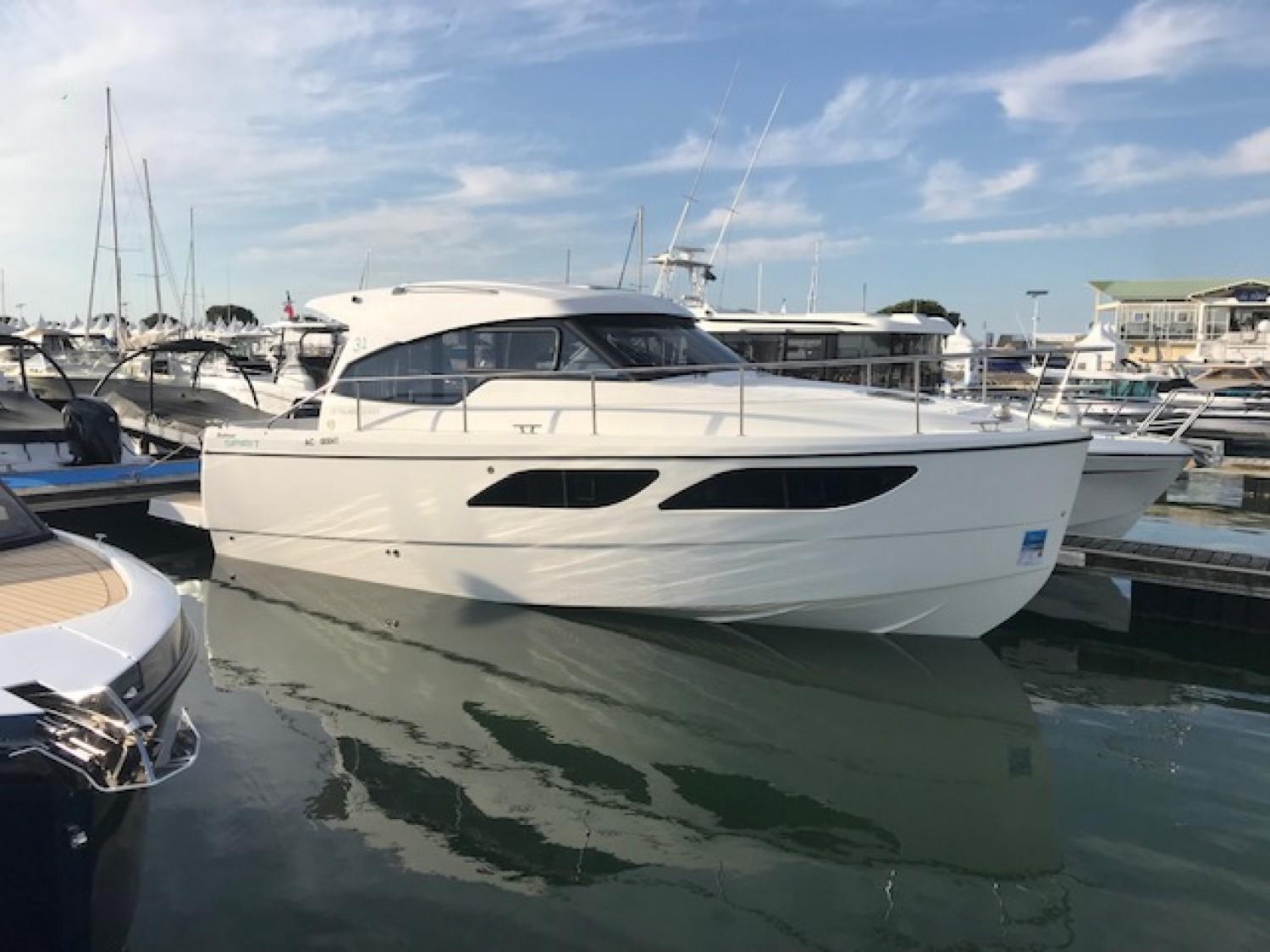 Rodman Spirit 31 Hard Top 2022 Rodman Spirit 31 Hard Top yacht docked at marina under clear sky.