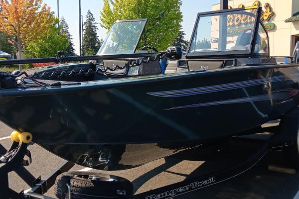 Ranger VX1888 WT 2024 Ranger VX1888 WT boat on trailer, parked outdoors.
