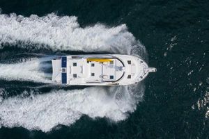 Ranger Tugs R-43 S Aerial view of 2025 Ranger Tugs R-43 S yacht cruising on open water.