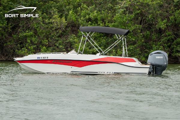 Starcraft SVX 211 OB 2024 Starcraft SVX 211 OB boat with Yamaha outboard on a calm river.