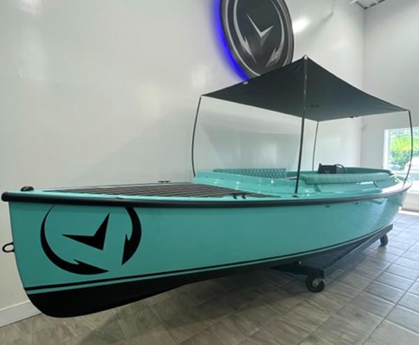 Vision Marine Technologies Fantail 217 2023 Vision Marine Technologies Fantail 217 boat with canopy, displayed indoors.