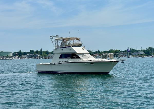 Hatteras 36 Convertible 1985 Hatteras 36 Convertible yacht on calm water.