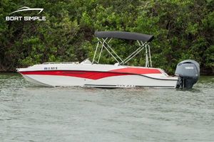 Starcraft SVX 211 OB 2024 Starcraft SVX 211 OB boat with Yamaha outboard, cruising on a calm river.