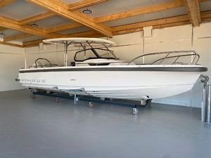 Nimbus T9 2025 Nimbus T9 boat in a modern indoor storage facility.