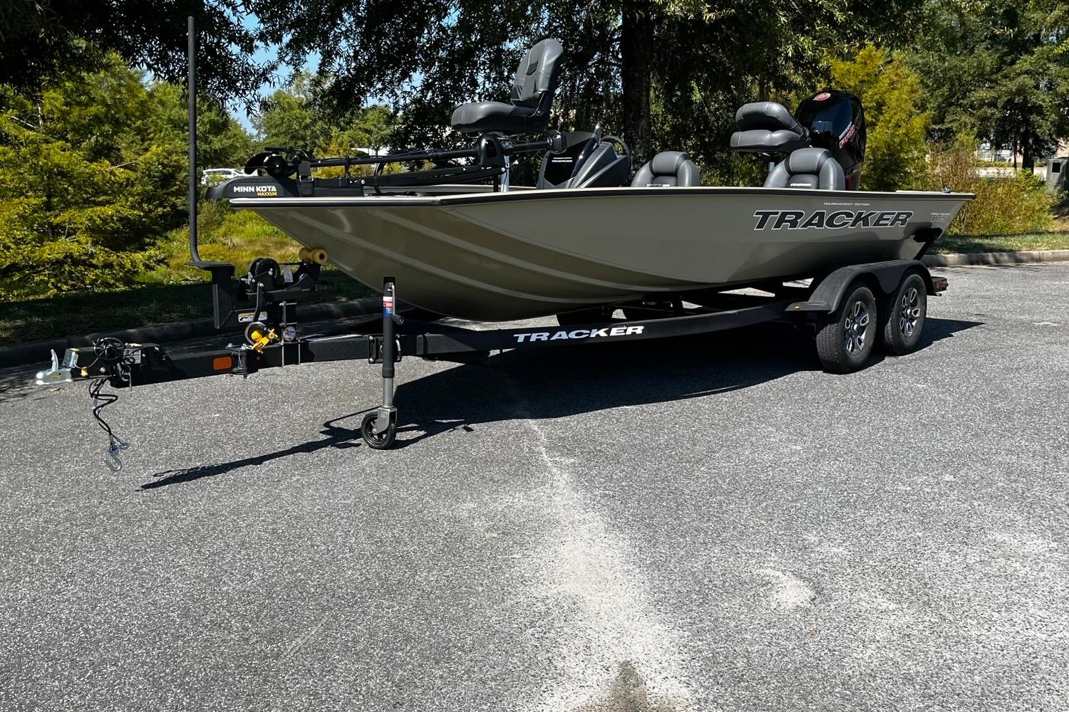Tracker Pro Team 195 2026 Tracker Pro Team 195 boat on trailer in outdoor setting.
