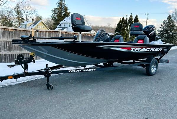 Tracker Pro Team 190 2025 Tracker Pro Team 190 boat on trailer, parked outdoors.