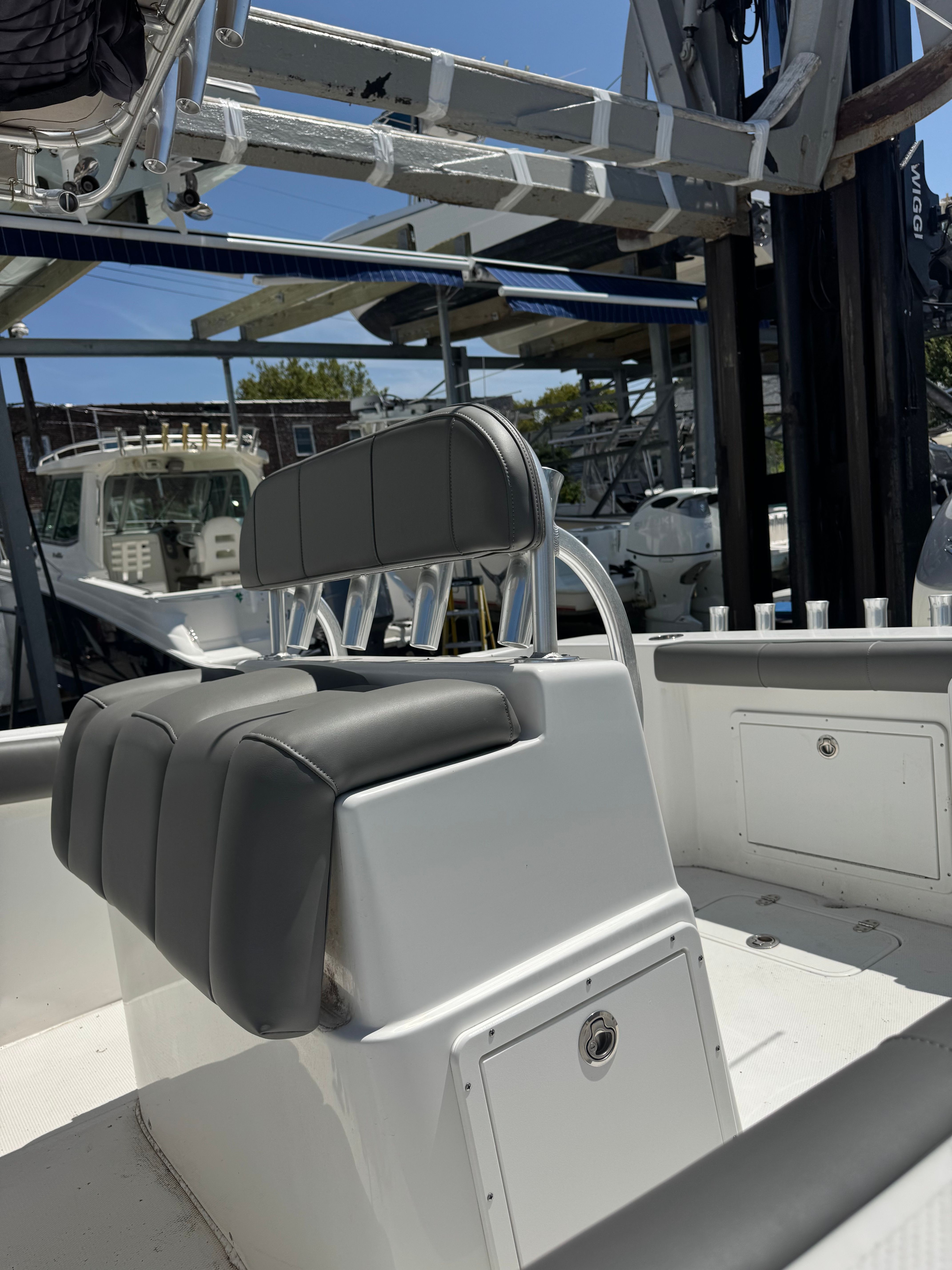 Cape Horn 22 OS 2018 Cape Horn 22 OS boat interior with gray seating and storage compartments.