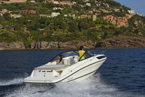 Bayliner VR5 Cuddy 2022 Bayliner VR5 Cuddy cruising on scenic coastal waters.