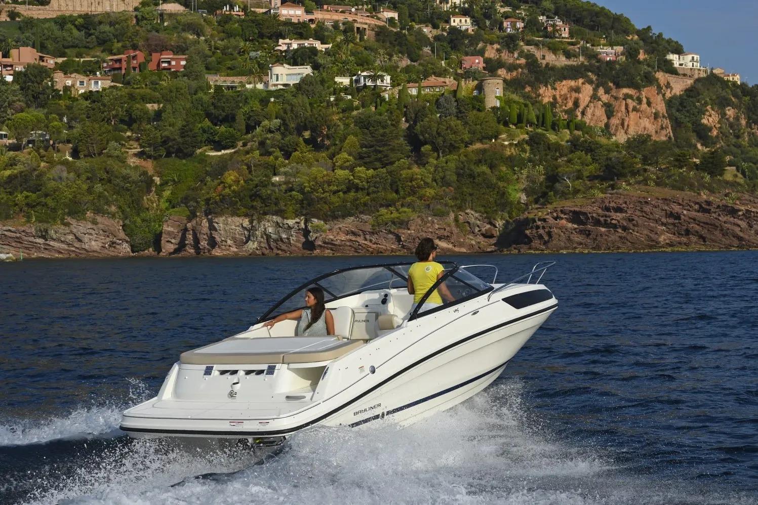 Bayliner VR5 Cuddy 2022 Bayliner VR5 Cuddy cruising on scenic coastal waters.