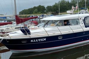 Nimbus 380 Coupe Nimbus 380 Coupe 2005 boat named "Kluten" docked in a marina.
