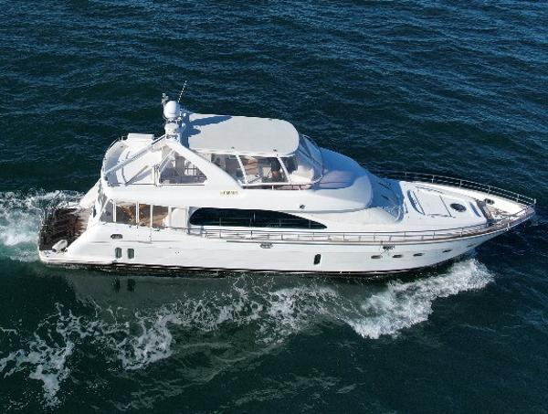 Horizon P70 Luxurious 2004 Horizon P70 yacht cruising on open sea waters.
