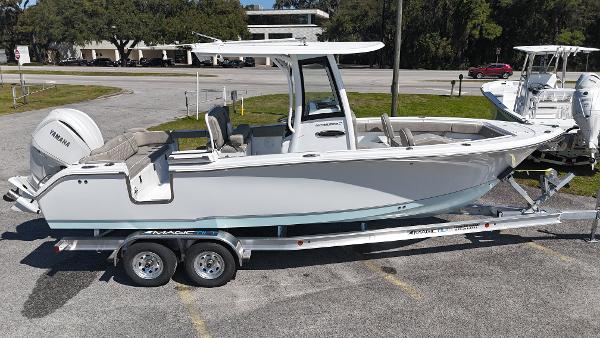Sea Hunt Ultra 255 SE 2025 Sea Hunt Ultra 255 SE boat on trailer, parked outdoors.