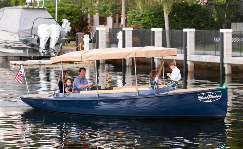 Vision Marine Technologies Fantail 217 2023 Vision Marine Technologies Fantail 217 boat cruising with passengers on a calm waterway.