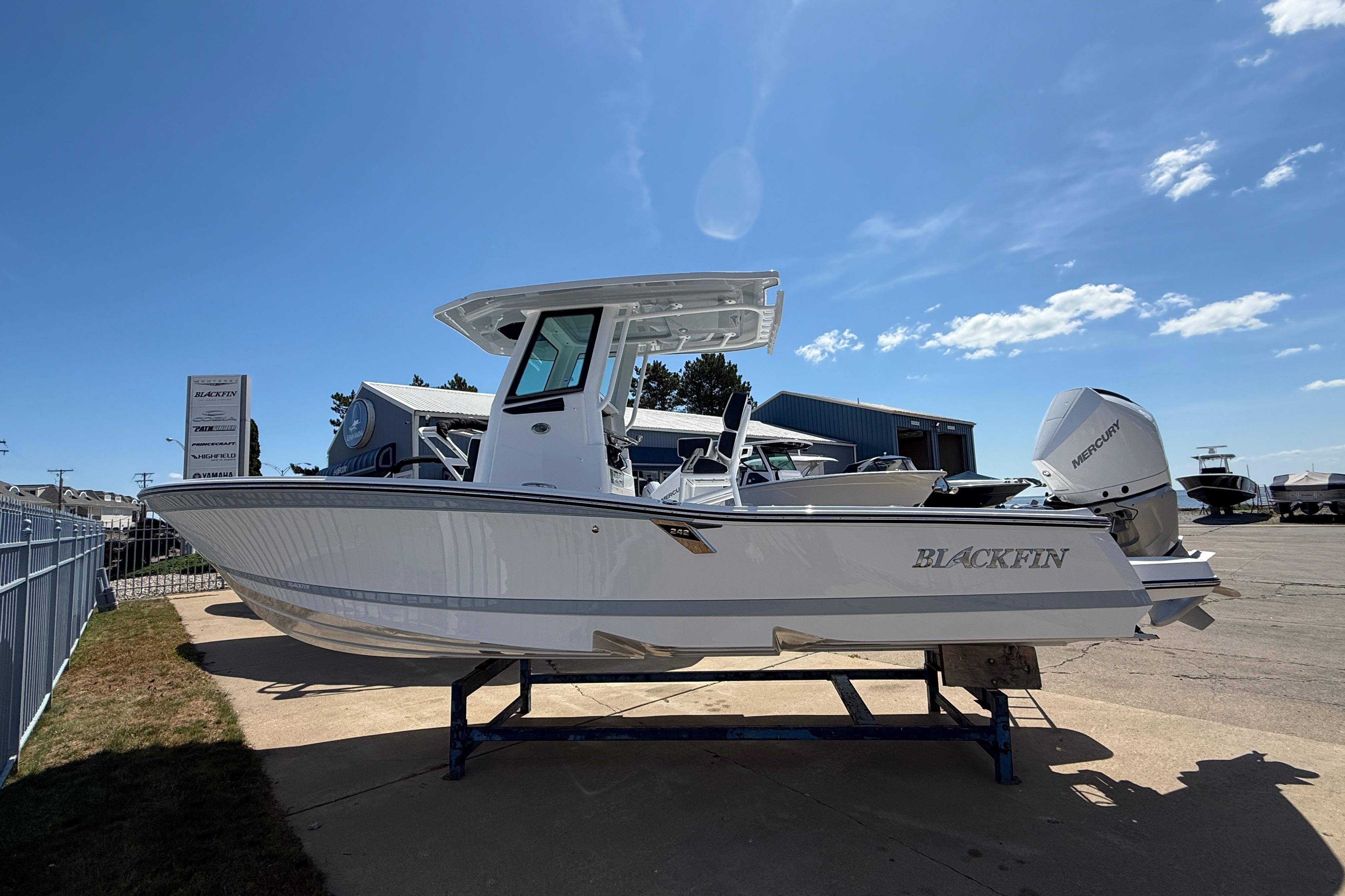 Blackfin 242 HB 2026 Blackfin 242 HB boat displayed outdoors under clear blue sky.