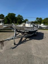 Twin Vee Center Console 2006 Twin Vee Center Console boat on trailer in outdoor lot.