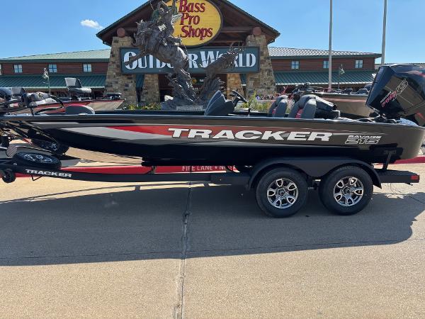 Tracker Savage 215 2025 Tracker Savage 215 boat parked outside Bass Pro Shops.