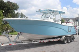 Sea Fox 288 Commander 2026 Sea Fox 288 Commander boat on trailer, light blue hull, parked outdoors.