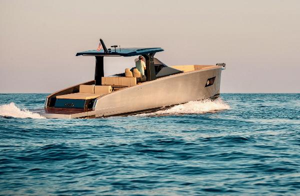 Tesoro T40 Inboard 2022 Tesoro T40 Inboard yacht cruising on open water at sunset.