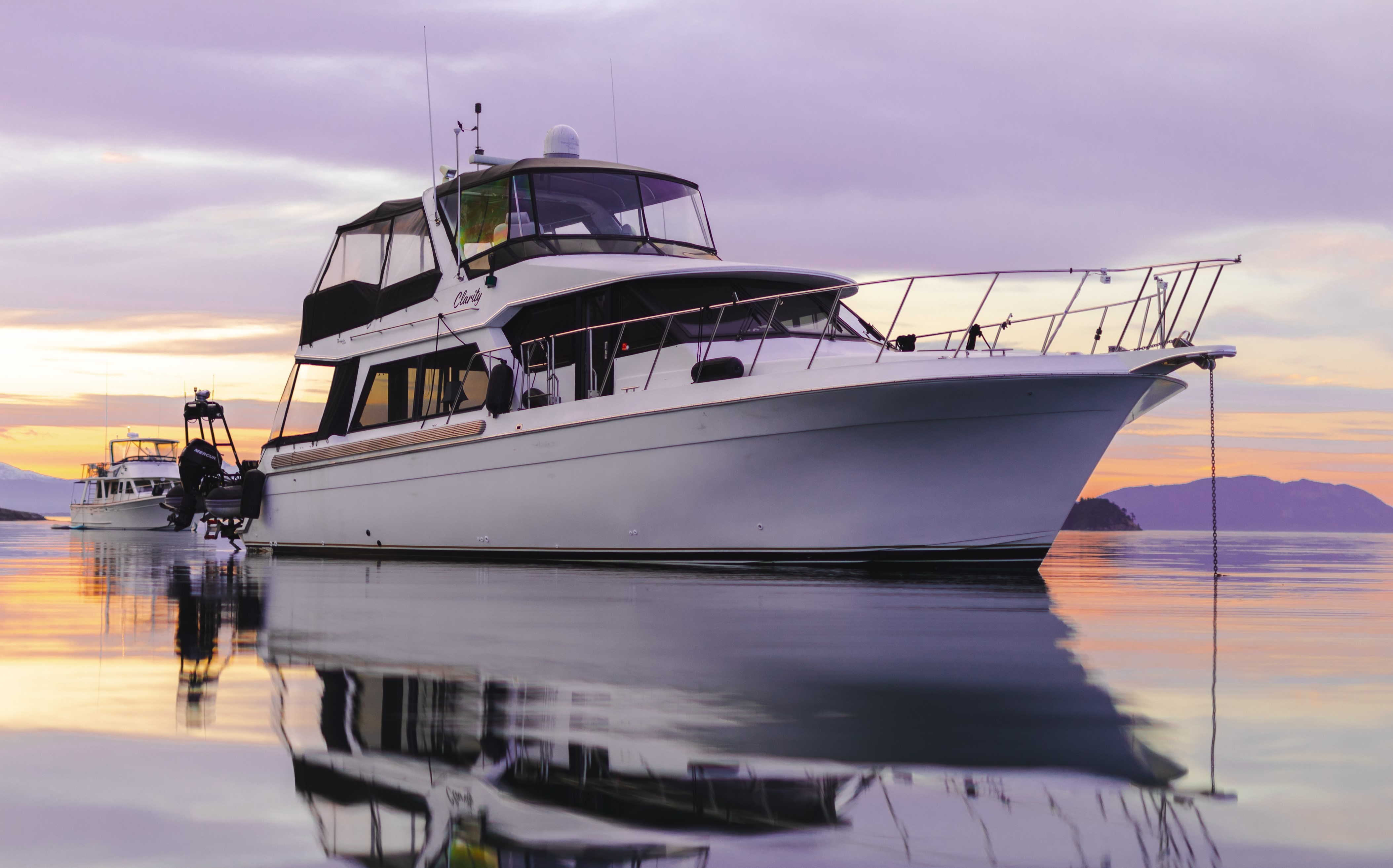 Navigator 50 Navigator 50 yacht from 1995 anchored at sunset on calm waters.