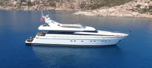 Cantieri di Pisa AKHIR 85 Luxurious 2007 Cantieri di Pisa AKHIR 85 yacht cruising in serene blue waters.