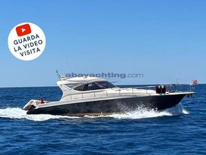 Cayman Yachts 43 WA 2005 Cayman Yachts 43 WA cruising on open sea under clear blue sky.