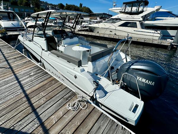 Jeanneau Leader 7.5 WA 2024 Jeanneau Leader 7.5 WA boat docked, featuring Yamaha outboard motor.