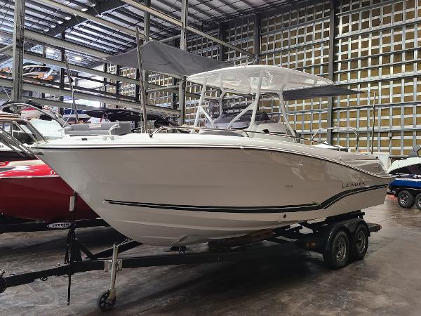 Jeanneau Leader 7.5 WA 2024 Jeanneau Leader 7.5 WA boat on trailer in storage facility.