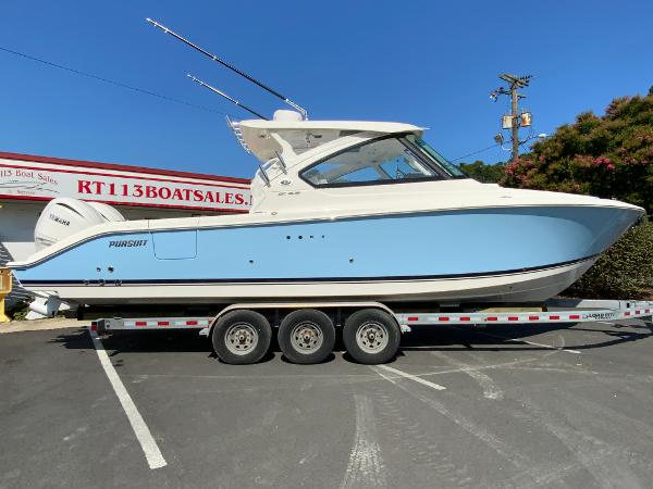 Pursuit DC 306 Dual Console 2025 Pursuit DC 306 Dual Console boat on a trailer at RT113 Boat Sales.