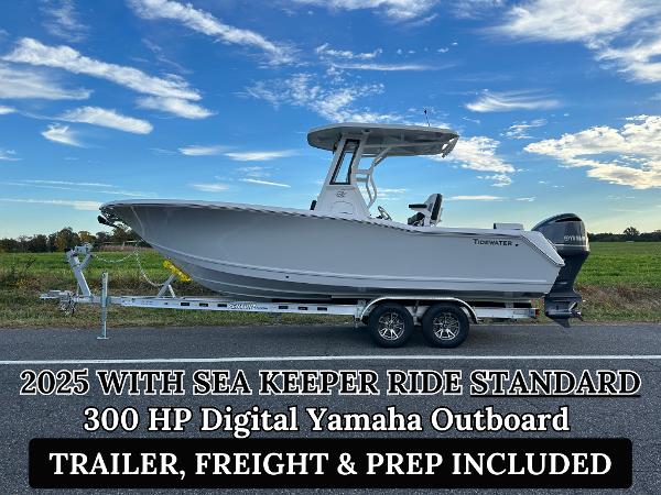 Tidewater 232 SS 2025 Tidewater 232 SS boat with 300 HP Yamaha outboard on trailer, blue sky background.