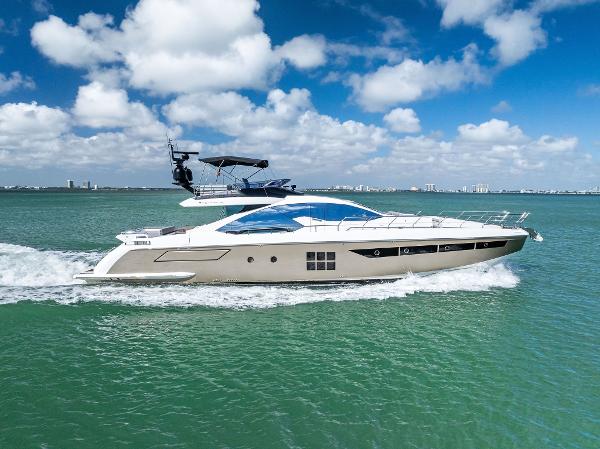 Azimut 77S Azimut 77S 2017 yacht cruising on turquoise waters under a clear blue sky.