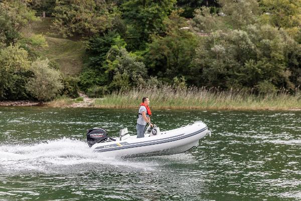 ZAR Mini LUX 12 2023 ZAR Mini LUX 12 inflatable boat on a lake.