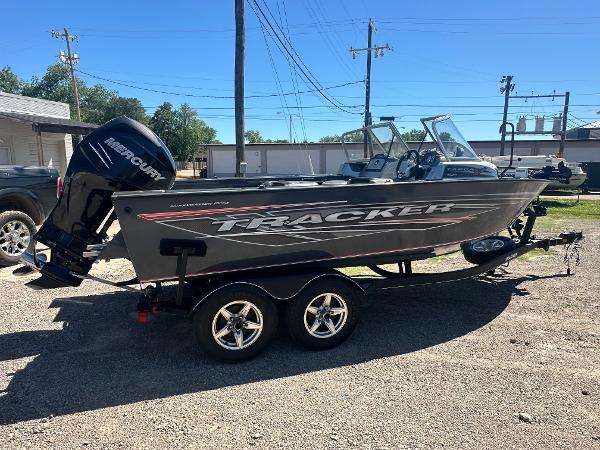 Tracker Targa V-19 WT 40th Anniversary Edition 2018 Tracker Targa V-19 WT 40th Anniversary Edition boat on trailer, side view.