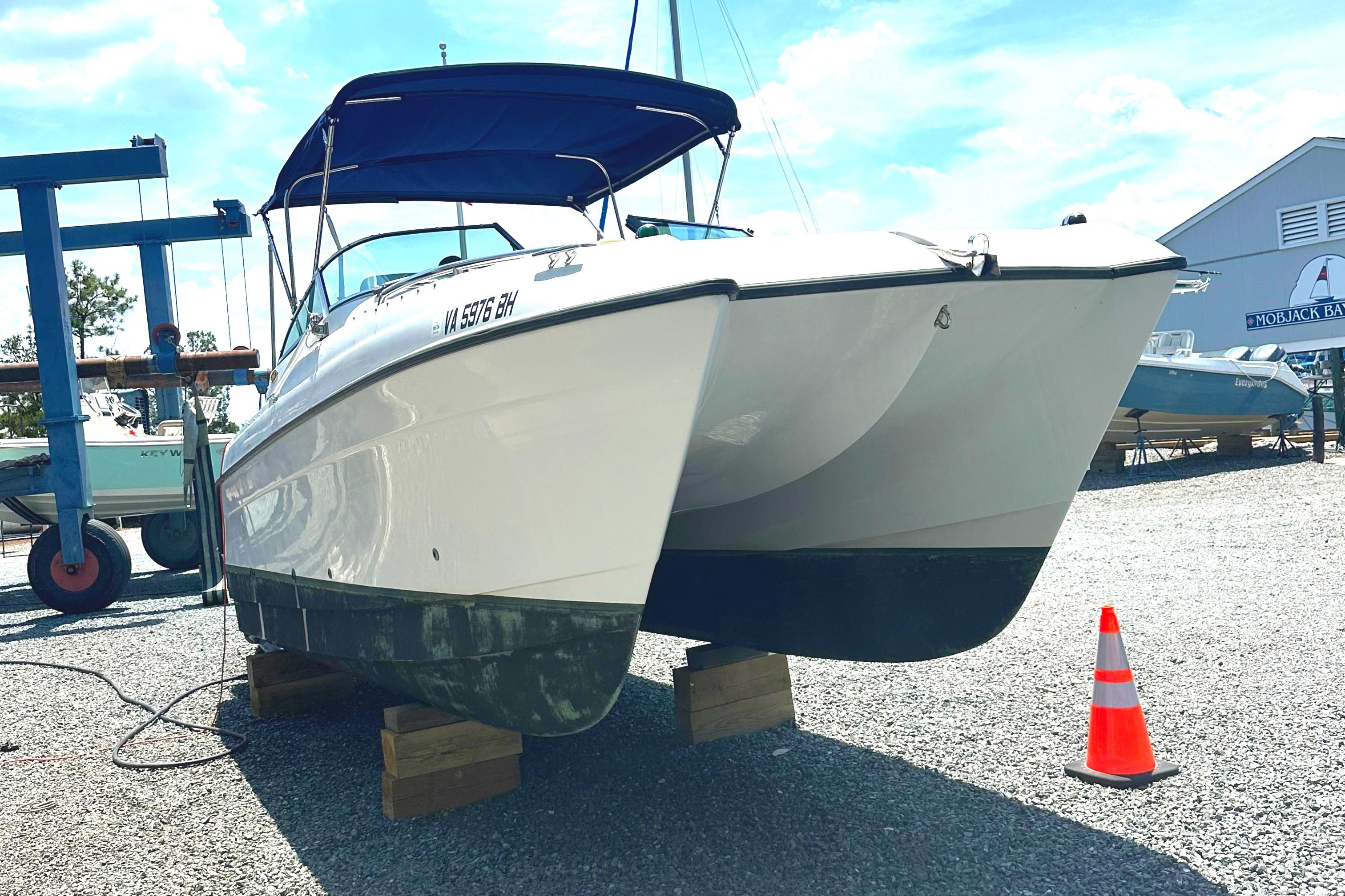 Glacier Bay 2240 Dual Console 2006 Glacier Bay 2240 Dual Console boat on blocks in a marina setting.